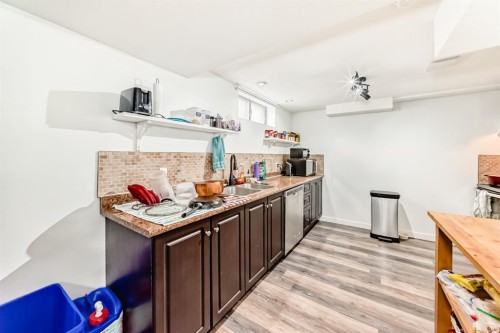 176 Hendon Drive Nw, Calgary, AB - Indoor Photo Showing Kitchen With Double Sink