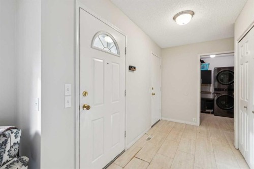 124 Woodmark Crescent Sw, Calgary, AB - Indoor Photo Showing Other Room