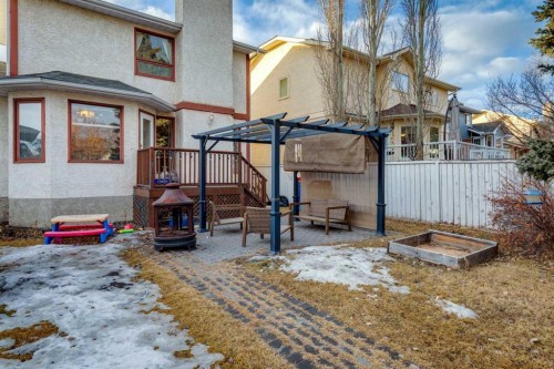 124 Woodmark Crescent Sw, Calgary, AB - Outdoor