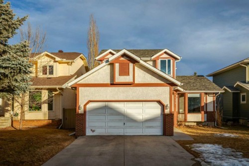 124 Woodmark Crescent Sw, Calgary, AB - Outdoor With Facade