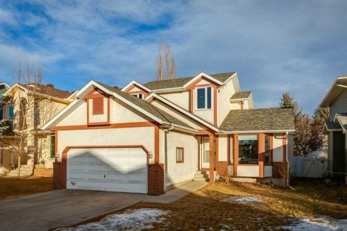 124 Woodmark Crescent Sw, Calgary, AB - Outdoor With Facade