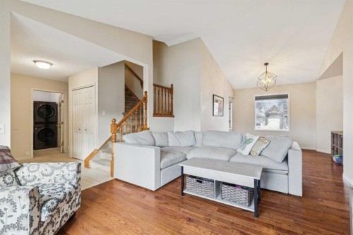 124 Woodmark Crescent Sw, Calgary, AB - Indoor Photo Showing Living Room