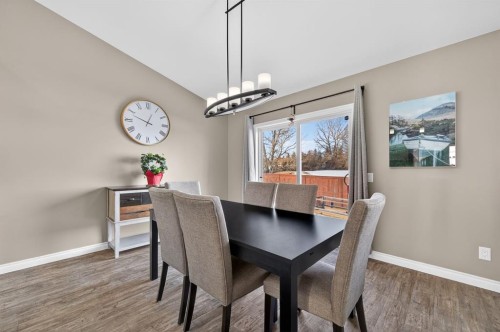 26 Mackenzie Way, Carstairs, AB - Indoor Photo Showing Dining Room