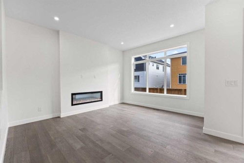 108 Waterford Way, Chestermere, AB - Indoor Photo Showing Other Room With Fireplace