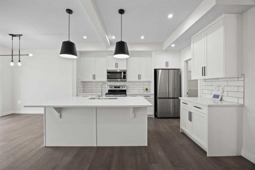 108 Waterford Way, Chestermere, AB - Indoor Photo Showing Kitchen With Stainless Steel Kitchen With Upgraded Kitchen