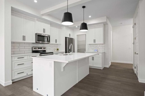 108 Waterford Way, Chestermere, AB - Indoor Photo Showing Kitchen With Stainless Steel Kitchen With Upgraded Kitchen
