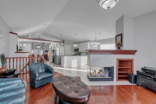 78 Mckenzie Lake Place Se, Calgary, AB - Indoor Photo Showing Living Room With Fireplace