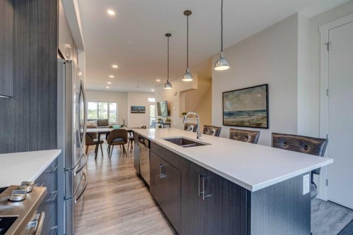 614 Greenbriar Common Nw, Calgary, AB - Indoor Photo Showing Kitchen With Double Sink With Upgraded Kitchen