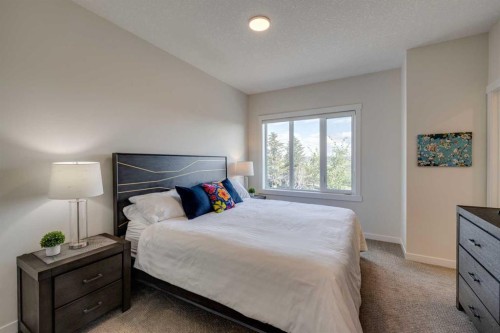 614 Greenbriar Common Nw, Calgary, AB - Indoor Photo Showing Bedroom
