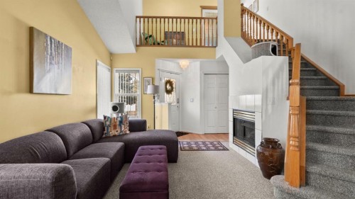 80 Arbour Grove Close Nw, Calgary, AB - Indoor With Fireplace