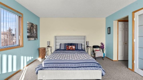 80 Arbour Grove Close Nw, Calgary, AB - Indoor Photo Showing Bedroom