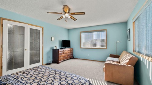 80 Arbour Grove Close Nw, Calgary, AB - Indoor Photo Showing Bedroom