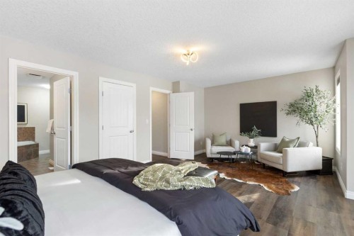 100 Lakeside View, Strathmore, AB - Indoor Photo Showing Bedroom