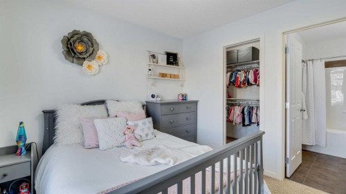 389 Cranberry Circle Se, Calgary, AB - Indoor Photo Showing Bedroom