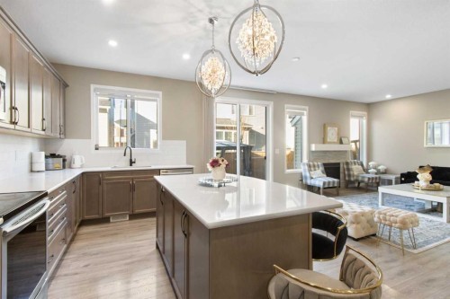 17 Carrington Manor Nw, Calgary, AB - Indoor Photo Showing Kitchen With Upgraded Kitchen