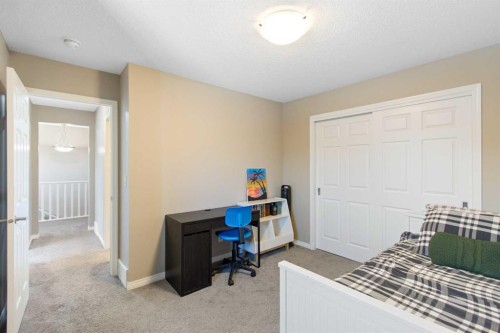 17 Carrington Manor Nw, Calgary, AB - Indoor Photo Showing Bedroom
