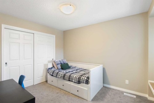 17 Carrington Manor Nw, Calgary, AB - Indoor Photo Showing Bedroom