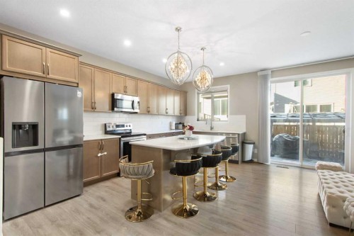 17 Carrington Manor Nw, Calgary, AB - Indoor Photo Showing Kitchen With Upgraded Kitchen