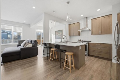 115 Bayview Circle, Airdrie, AB - Indoor Photo Showing Kitchen With Upgraded Kitchen