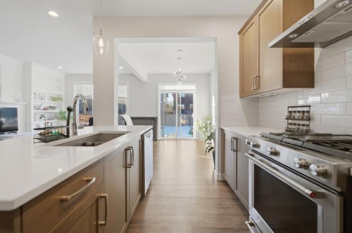 115 Bayview Circle, Airdrie, AB - Indoor Photo Showing Kitchen With Upgraded Kitchen