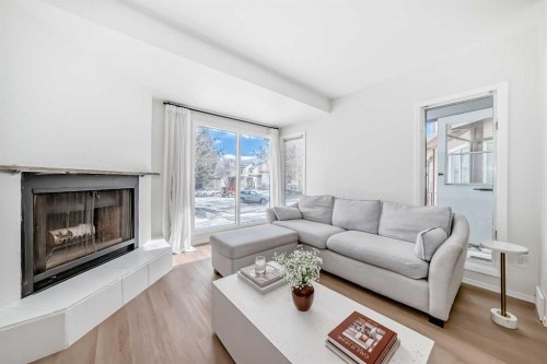 212 Cedarbrook Bay Sw, Calgary, AB - Indoor Photo Showing Living Room With Fireplace
