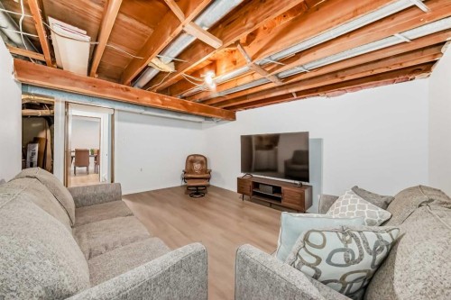 212 Cedarbrook Bay Sw, Calgary, AB - Indoor Photo Showing Basement