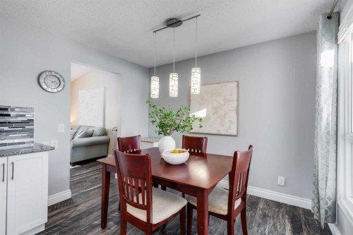 1205 Meadowbrook Drive Se, Airdrie, AB - Indoor Photo Showing Dining Room