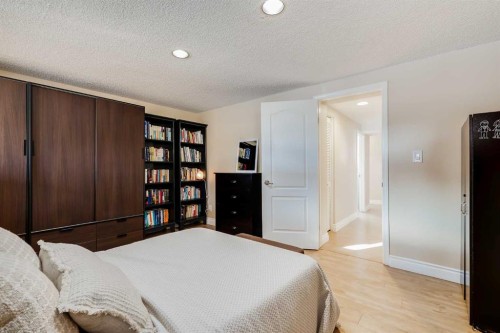 1205 Meadowbrook Drive Se, Airdrie, AB - Indoor Photo Showing Bedroom