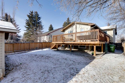 1205 Meadowbrook Drive Se, Airdrie, AB - Outdoor With Deck Patio Veranda