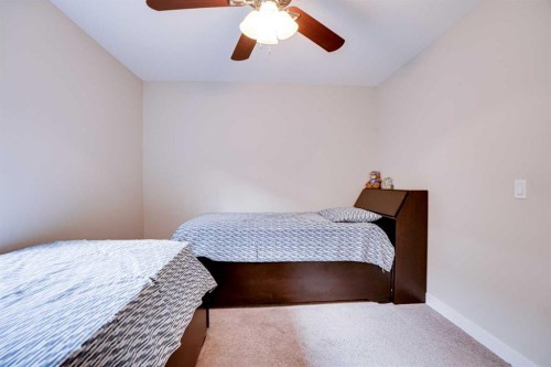 126 Saddlestone Park Ne, Calgary, AB - Indoor Photo Showing Bedroom