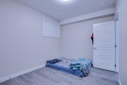 126 Saddlestone Park Ne, Calgary, AB - Indoor Photo Showing Bedroom
