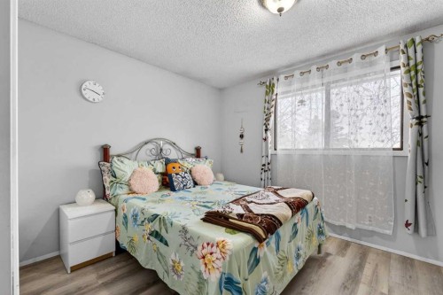 195 Fallswater Road Ne, Calgary, AB - Indoor Photo Showing Bedroom