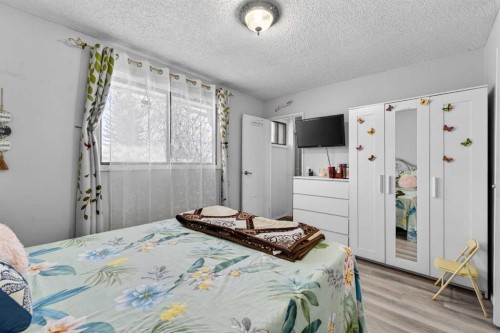 195 Fallswater Road Ne, Calgary, AB - Indoor Photo Showing Bedroom