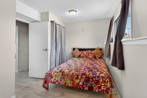 195 Fallswater Road Ne, Calgary, AB - Indoor Photo Showing Bedroom