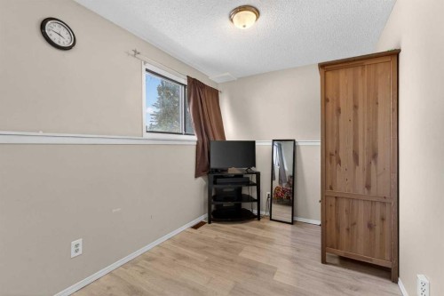 195 Fallswater Road Ne, Calgary, AB - Indoor Photo Showing Other Room