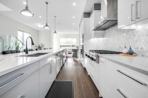 2415 25 Avenue Nw, Calgary, AB - Indoor Photo Showing Kitchen With Double Sink With Upgraded Kitchen