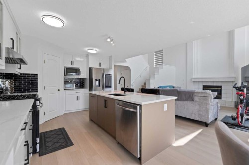7 Country Hills Park Nw, Calgary, AB - Indoor Photo Showing Kitchen With Stainless Steel Kitchen With Upgraded Kitchen