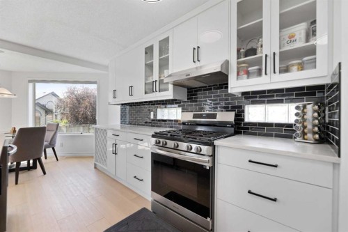 7 Country Hills Park Nw, Calgary, AB - Indoor Photo Showing Kitchen With Upgraded Kitchen