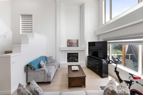 7 Country Hills Park Nw, Calgary, AB - Indoor Photo Showing Living Room With Fireplace
