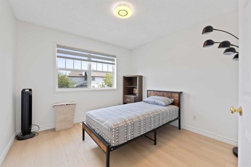 7 Country Hills Park Nw, Calgary, AB - Indoor Photo Showing Bedroom
