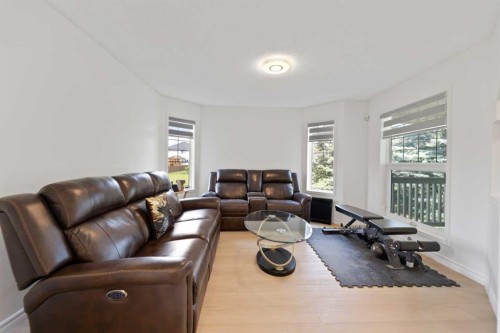 7 Country Hills Park Nw, Calgary, AB - Indoor Photo Showing Living Room