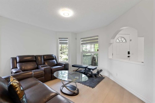 7 Country Hills Park Nw, Calgary, AB - Indoor Photo Showing Living Room
