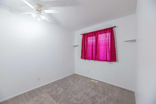 38 Martindale Drive Ne, Calgary, AB - Indoor Photo Showing Other Room