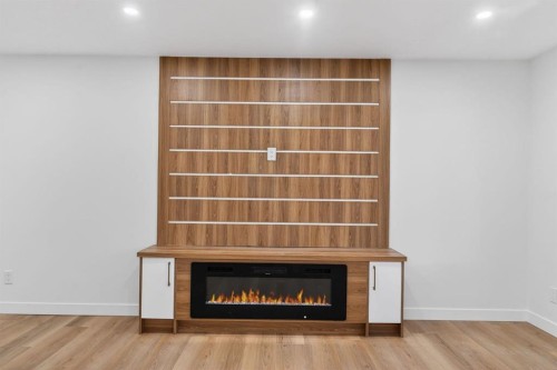 420 Pinegreen Close Ne, Calgary, AB - Indoor With Fireplace