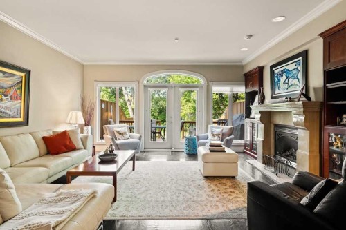 2421 Erlton Street Sw, Calgary, AB - Indoor Photo Showing Living Room With Fireplace