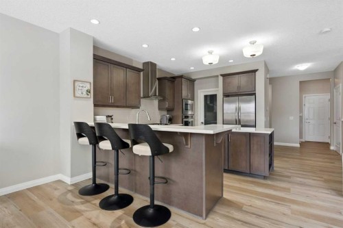 26 Marquis Heights Se, Calgary, AB - Indoor Photo Showing Kitchen With Upgraded Kitchen
