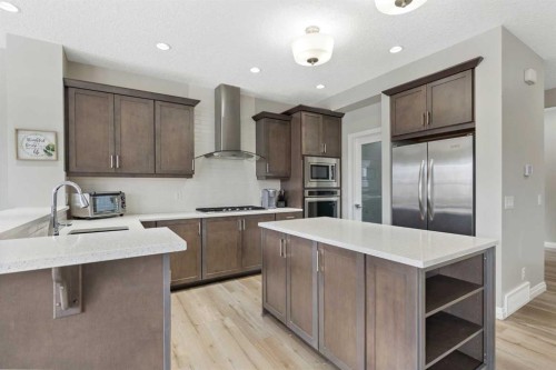 26 Marquis Heights Se, Calgary, AB - Indoor Photo Showing Kitchen With Stainless Steel Kitchen With Upgraded Kitchen