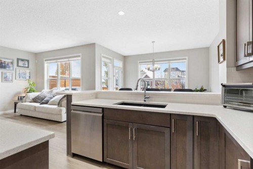 26 Marquis Heights Se, Calgary, AB - Indoor Photo Showing Kitchen With Double Sink