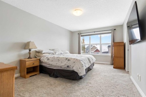 26 Marquis Heights Se, Calgary, AB - Indoor Photo Showing Bedroom