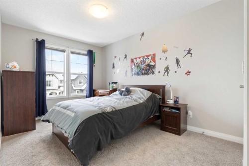 26 Marquis Heights Se, Calgary, AB - Indoor Photo Showing Bedroom